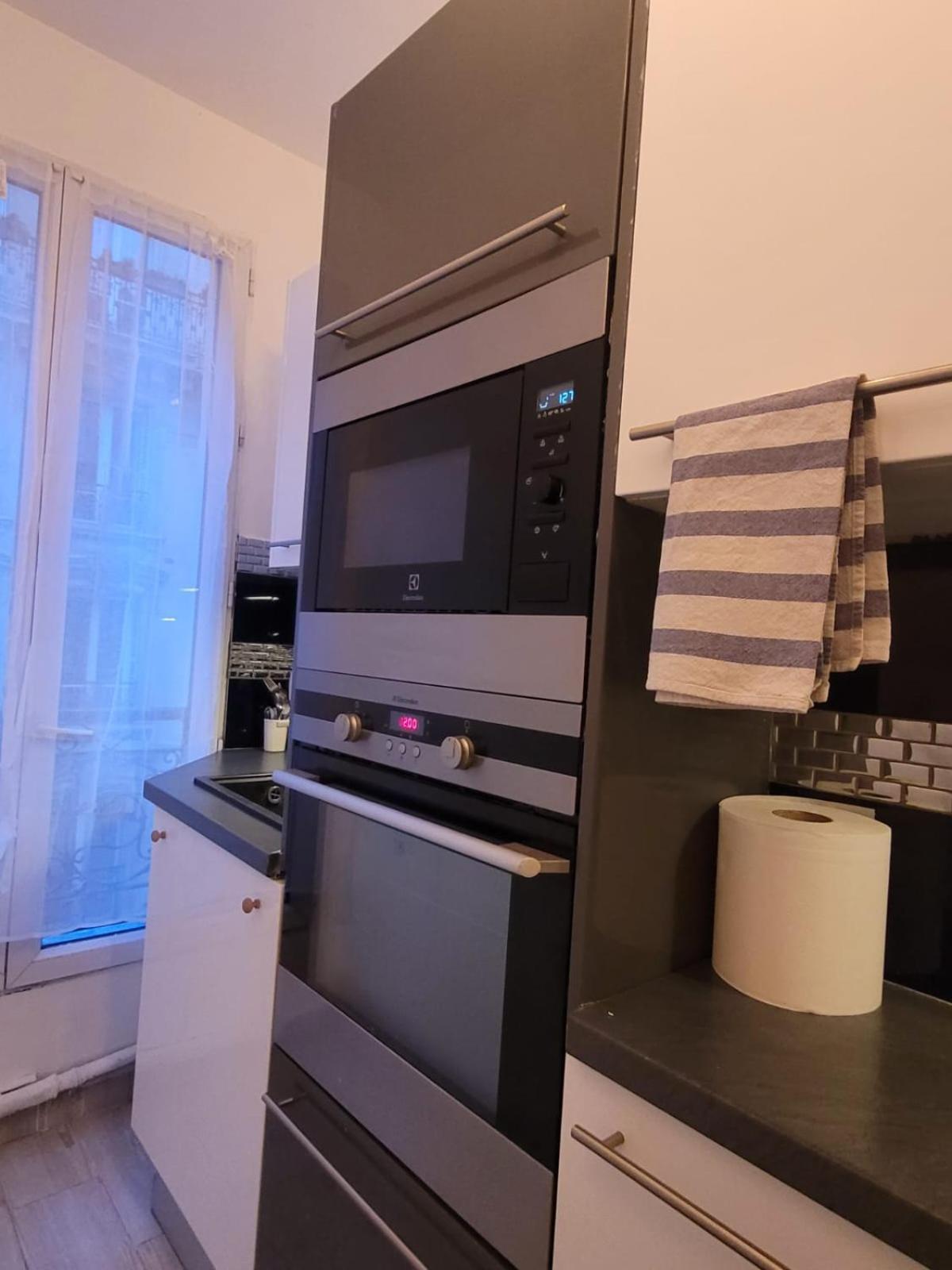 Charmant Appartement Pres De Montmartre 2 Paris Bagian luar foto
